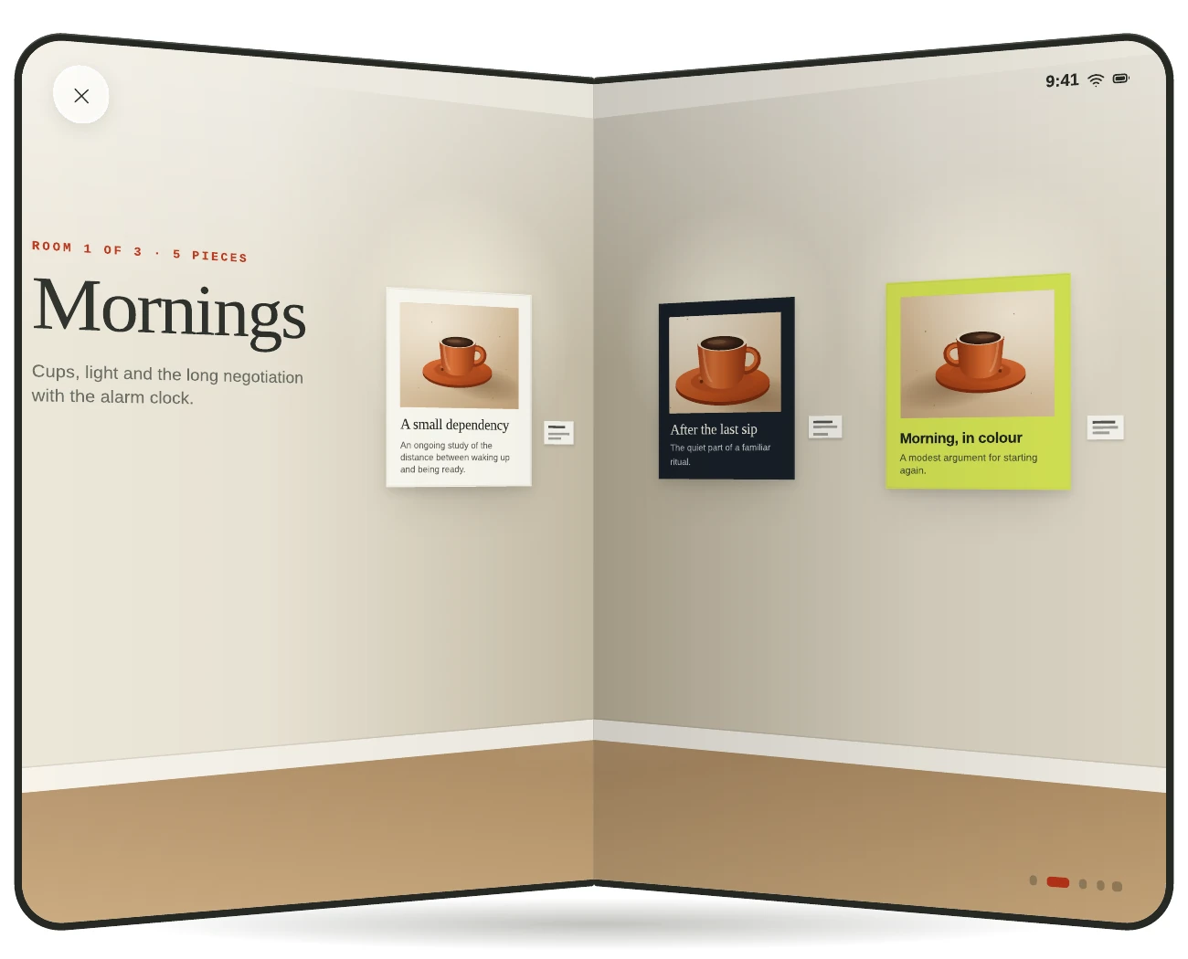 Concept mockup of iPhone Duo partly folded like a book, its two display halves forming the walls of an Exhibit gallery